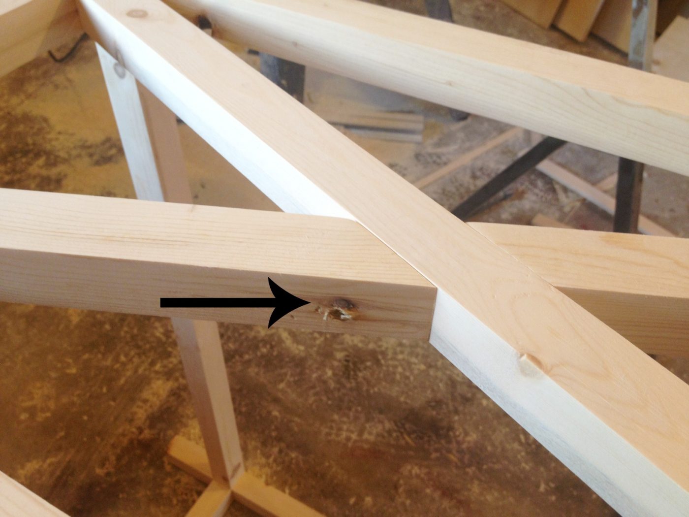 Close up showing where to attach X base trim on console table frame