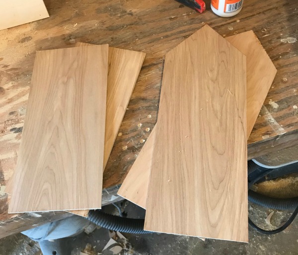 boards cut in house shape for DIY wooden Christmas village