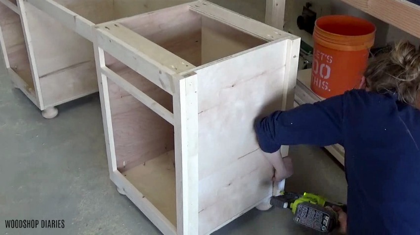 Shara Woodshop Diaries nailing trim around sides of home office desk