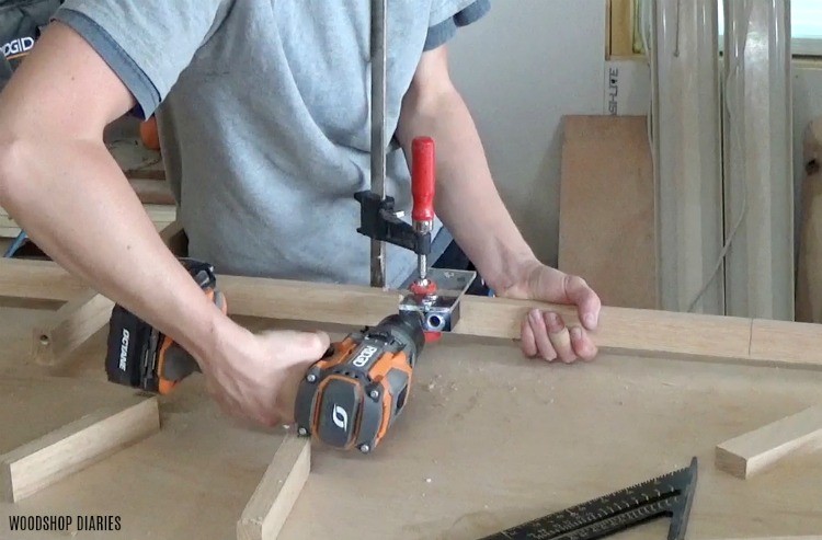 Shara Woodshop Diaries drilling dowel holes to assemble glass door divider panes