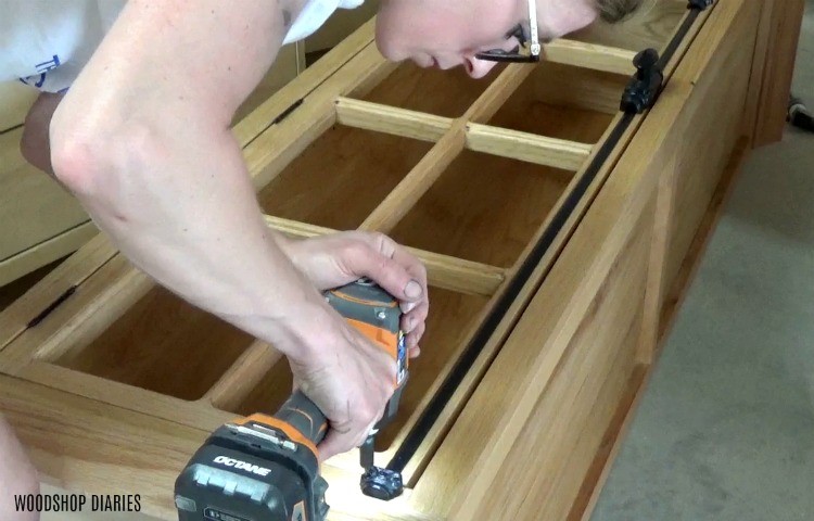 Shara Woodshop Diaries installing cremone bolt to linen cabinet door