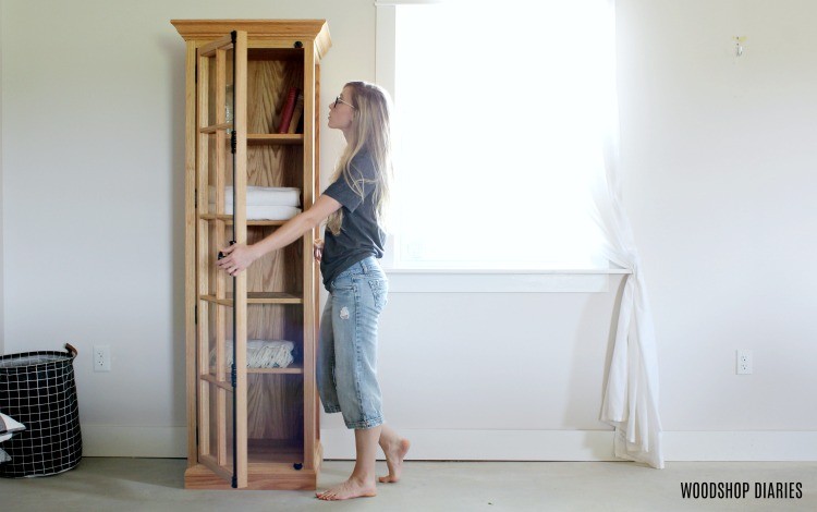 Shara Woodshop Diaries opening linen cabinet door