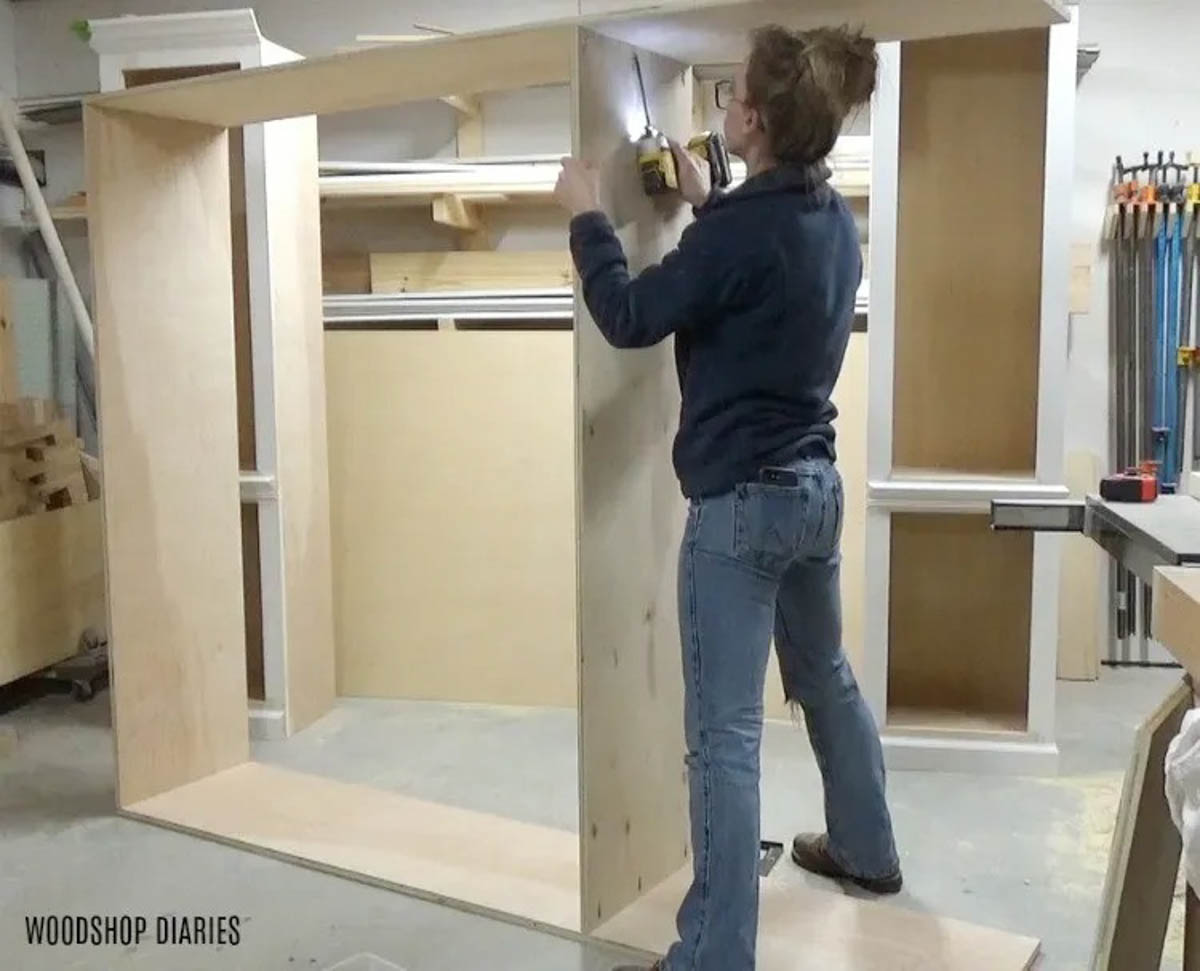 Shara Woodshop Diaries assembling middle cabinet of entertainment center in workshop