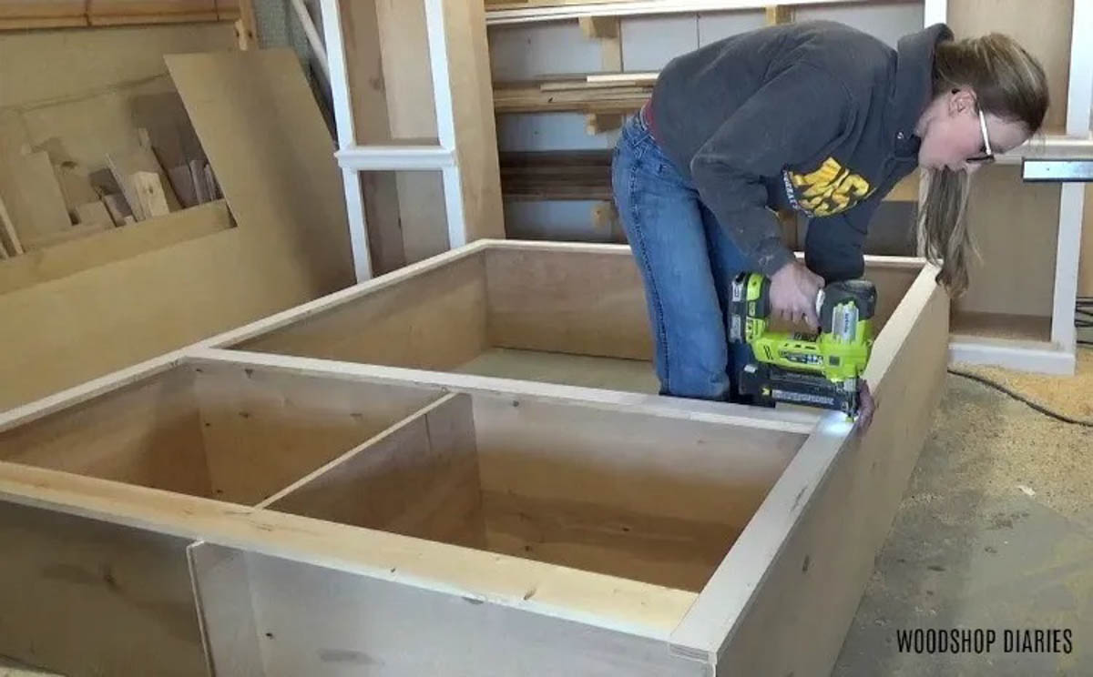 Shara Woodshop Diaries nailing face frame onto middle cabinet box