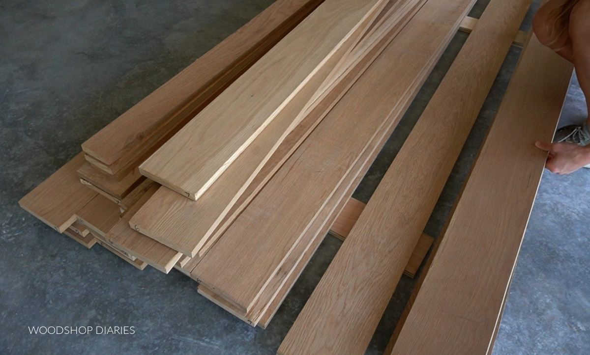stack of oak lumber on concrete floor