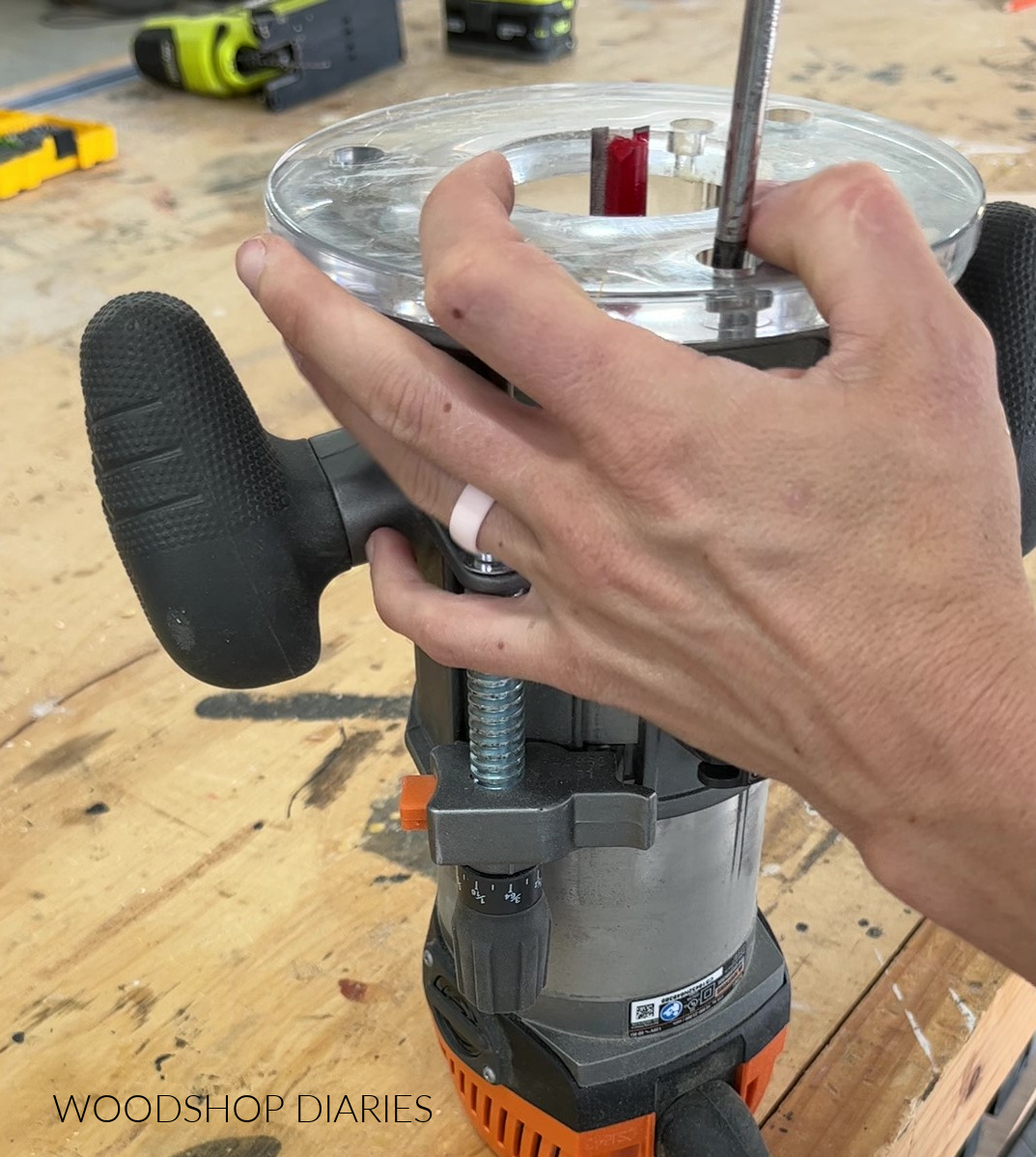 Removing screws from router sub plate using screwdriver