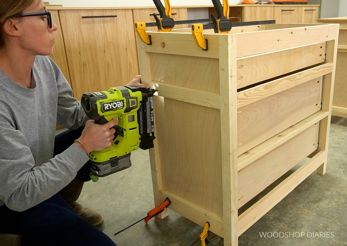 Shara Woodshop Diaries nailing trim details to sides of nightstands