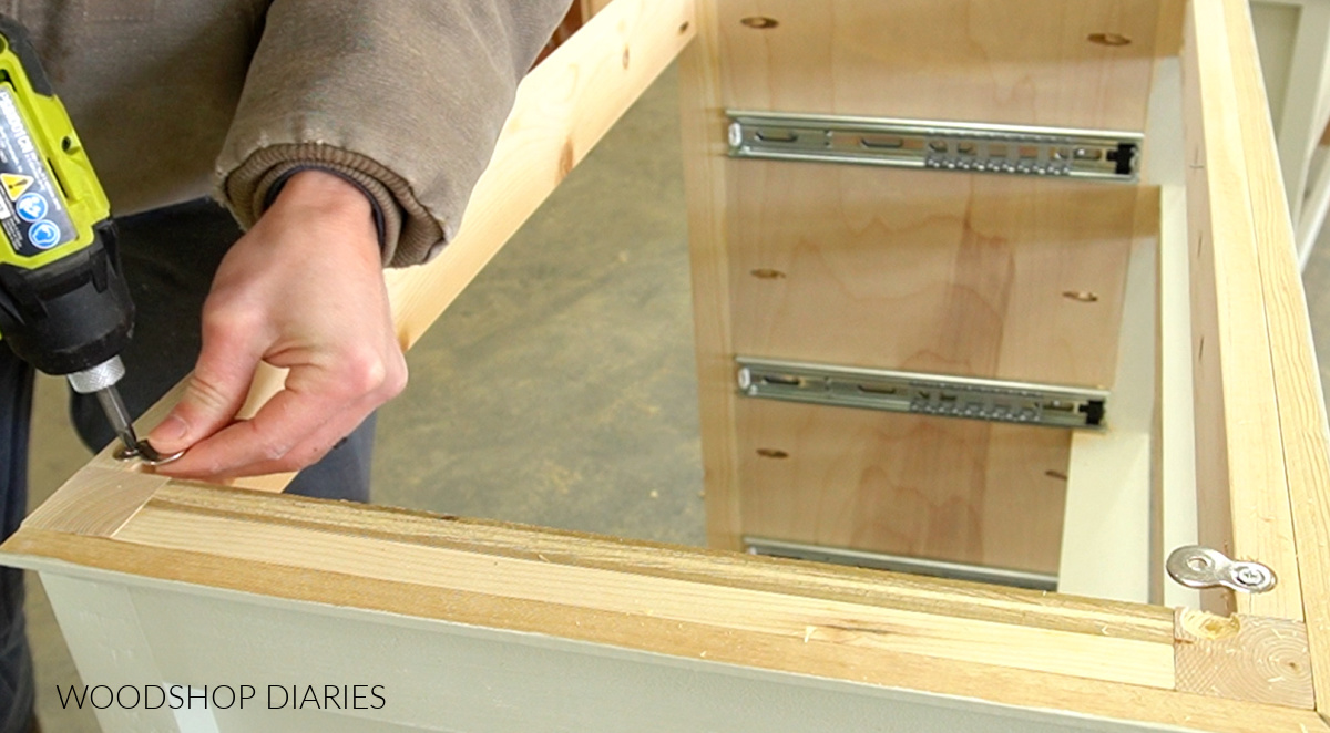 Screwing figure 8 fasteners to top of nightstand frame