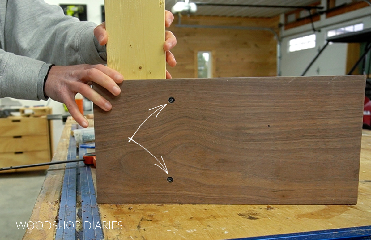 Image showing underside of catch all tray with countersunk holes 