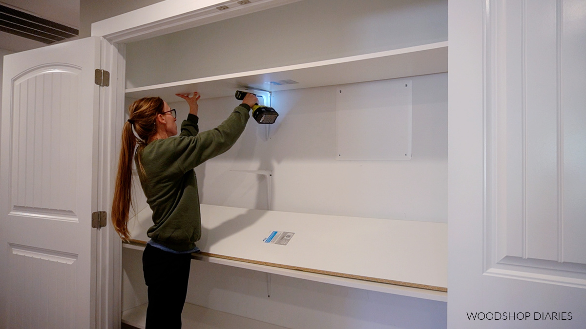 Shara Woodshop Diaries removing shelves and brackets from hallway closet