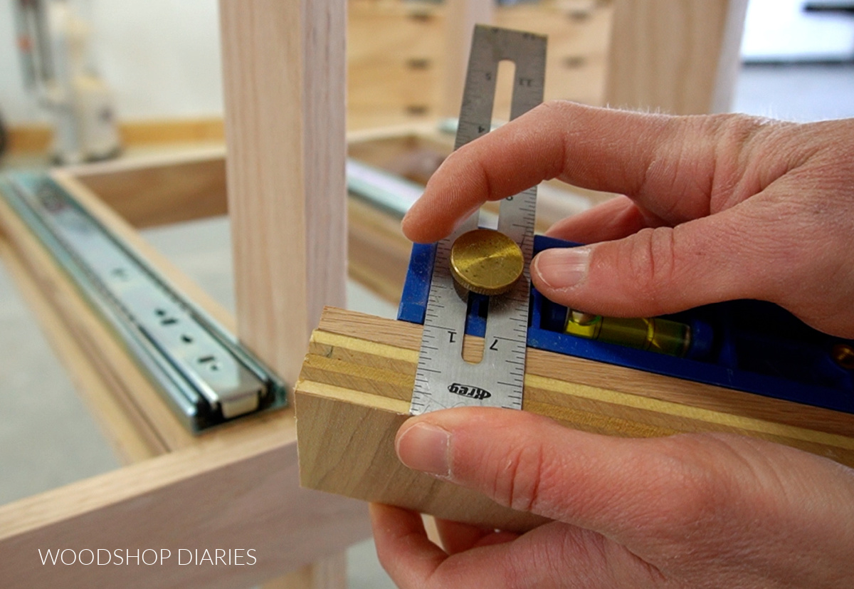 Close up of Kreg MultiMark tool to find drawer front thickness
