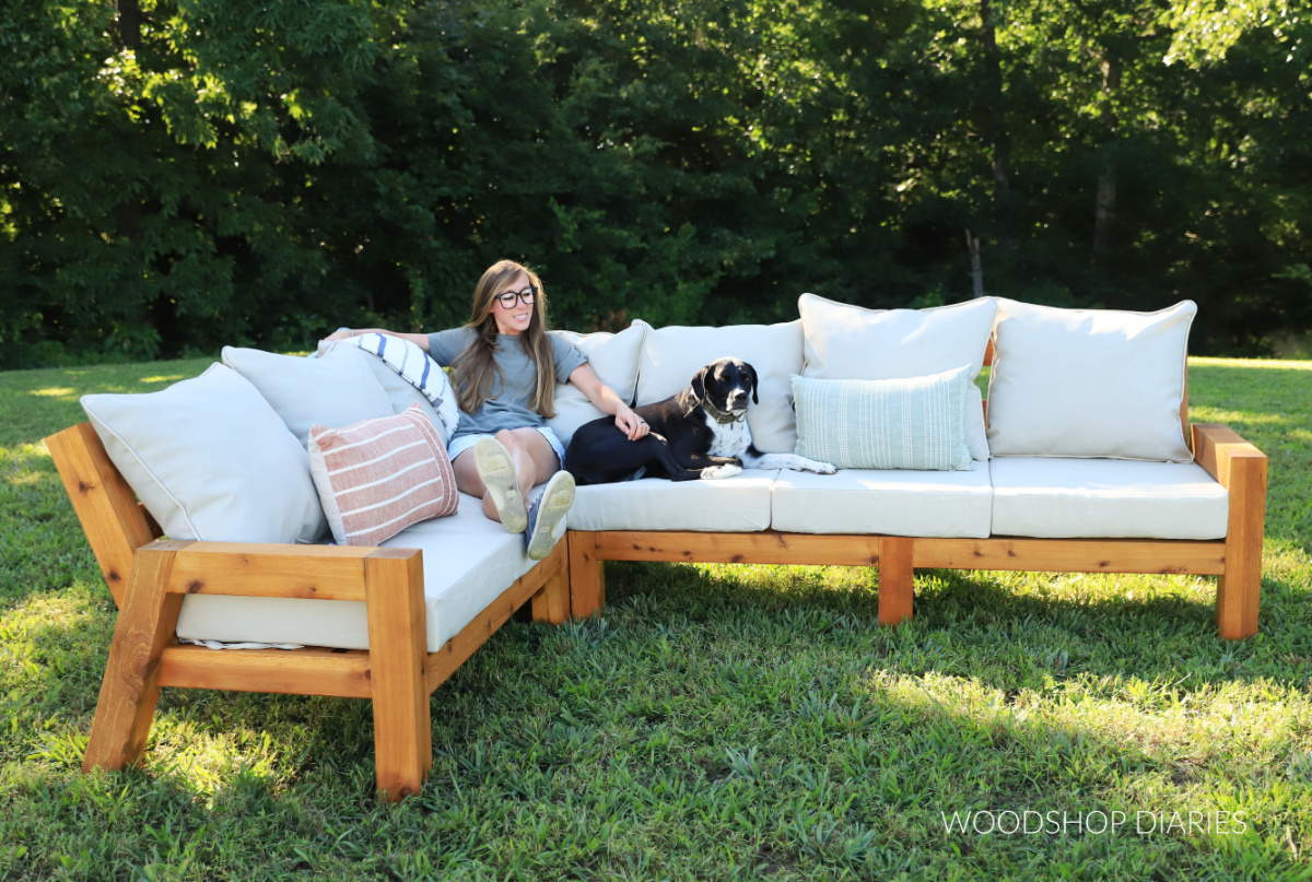 Shara and Lucy sitting on modular DIY outdoor sectional together in yard