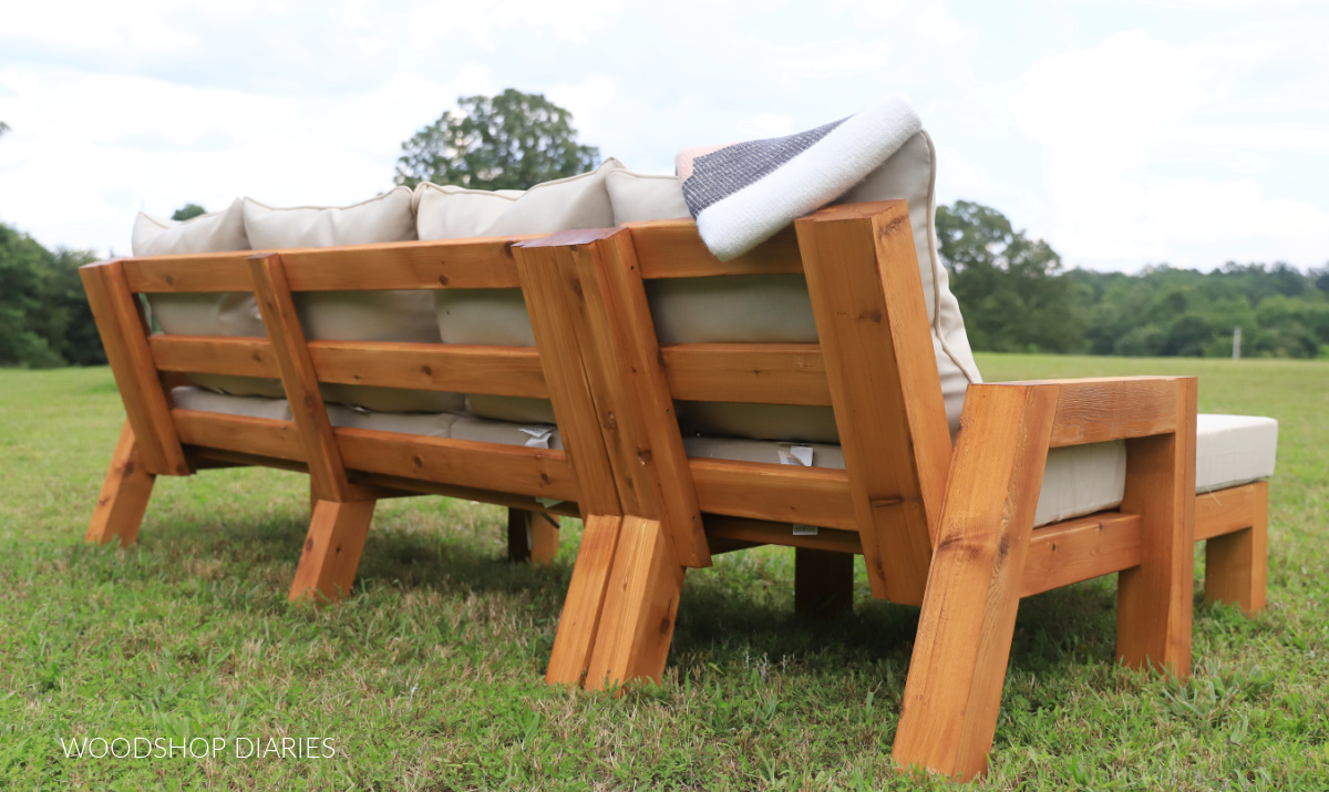 View of back side of DIY outdoor chaise sectional in yard