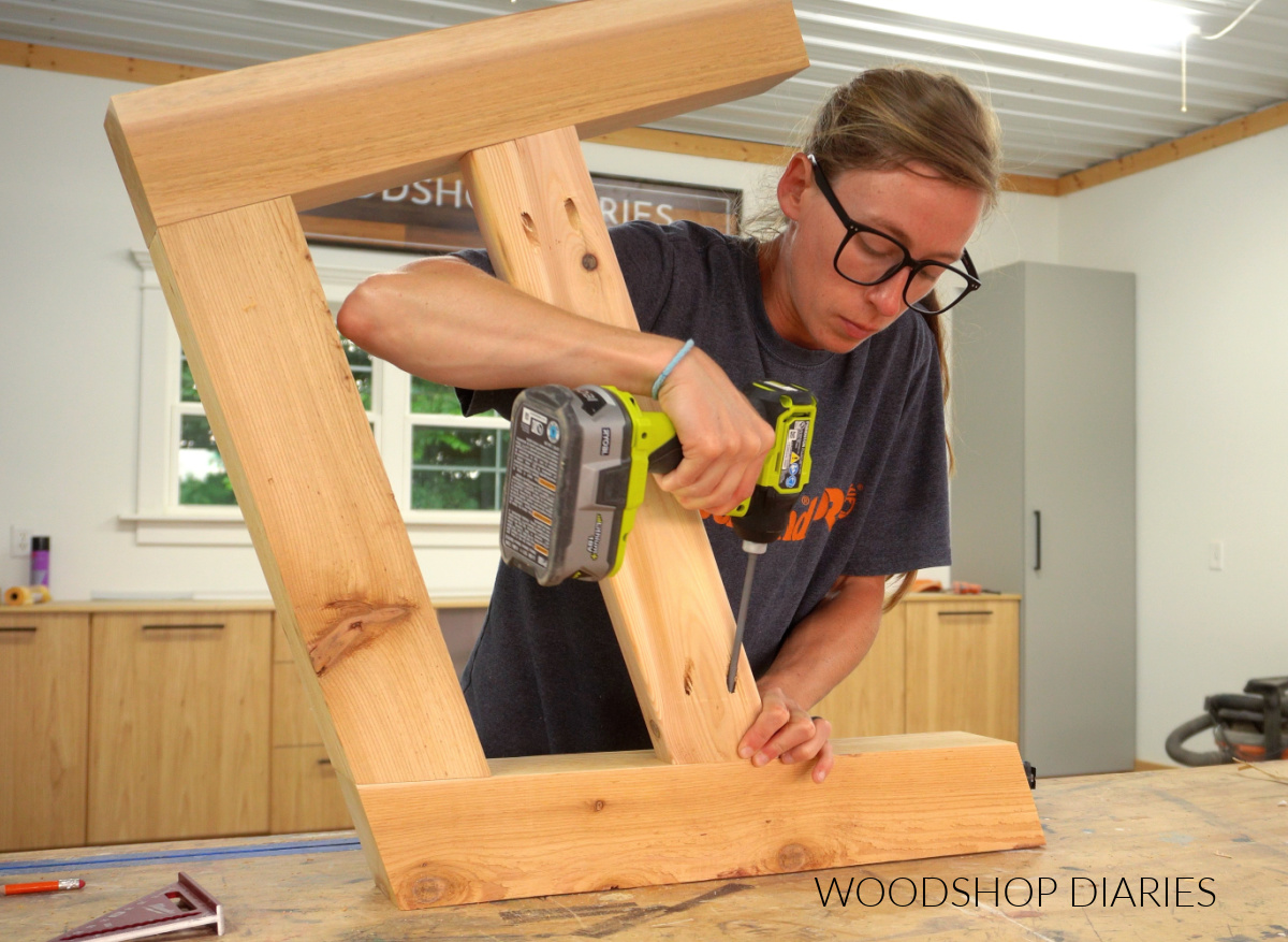 Shara Woodshop Diaries assembling seat supports between side frame of DIY outdoor chaise sectional
