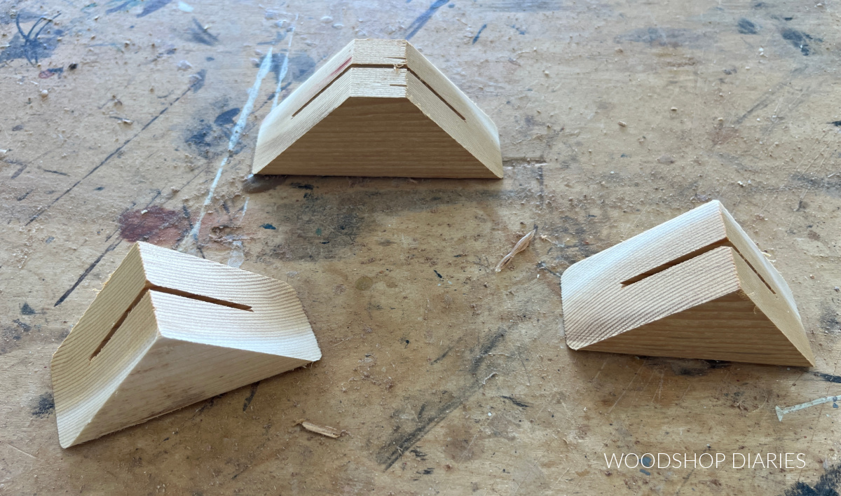 picture stand blocks with tips pointed up on workbench