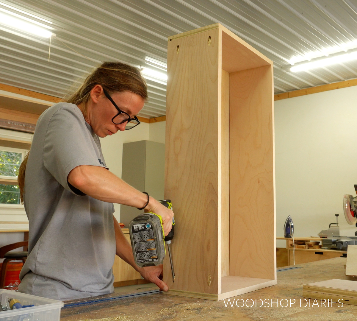 Shara Woodshop Diaries assembling large drawer box on workbench using pocket holes and screws
