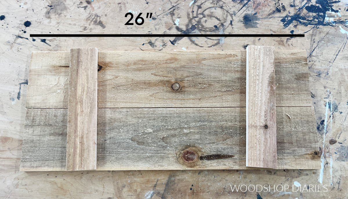 Cedar fence picket boards cut to make bottom panel of wooden wheelbarrow
