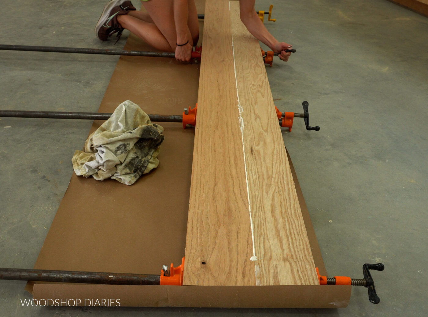 Shara Woodshop Diaries gluing two red oak boards together to make dining table top