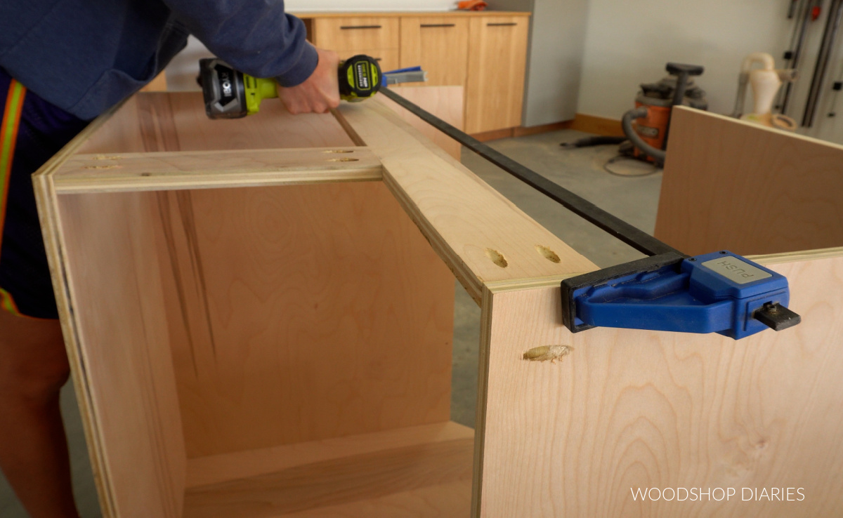 Shara Woodshop Diaries installing top supports to corner cabinet