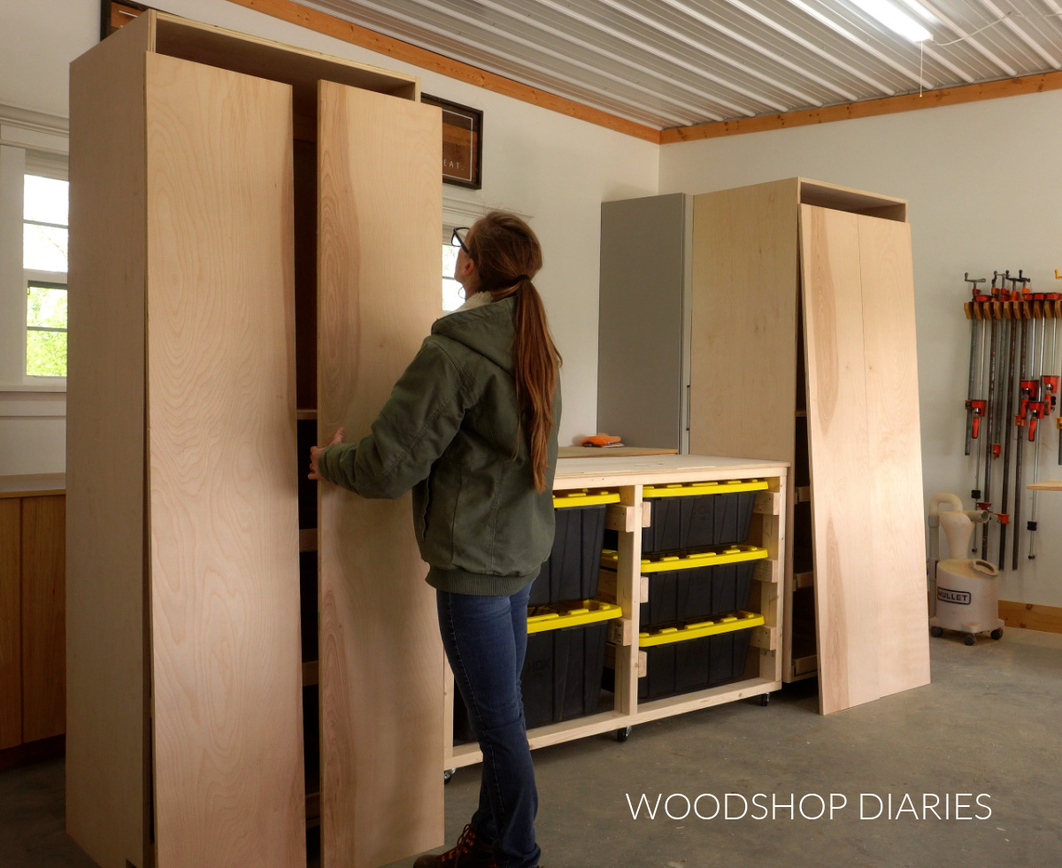 Shara Woodshop Diaries placing large cabinet doors against front of large cabinets