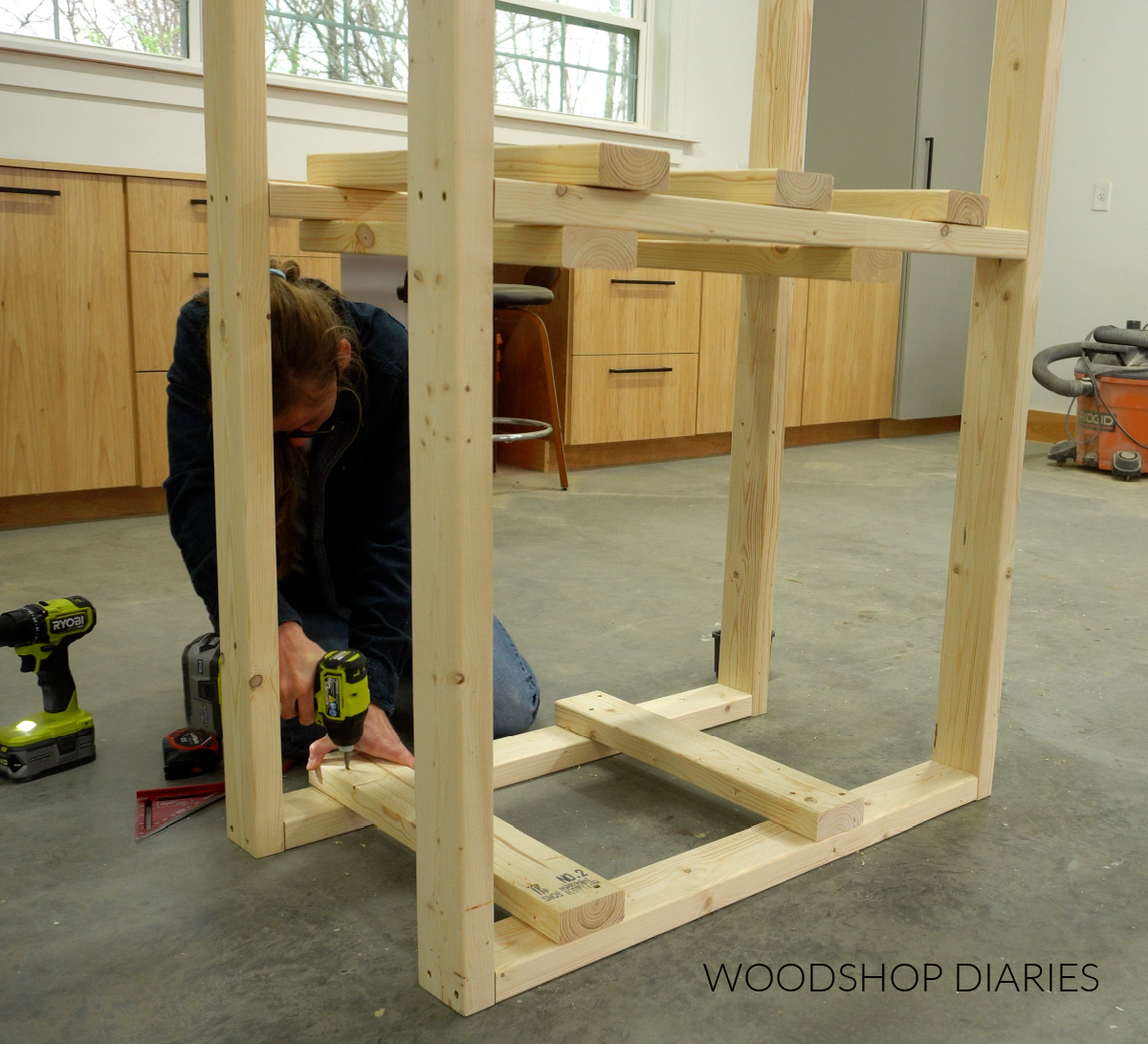 Shara Woodshop Diaries installing supports for tote storage workbench