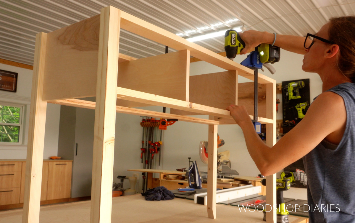 Shara Woodshop Diaries attaching drawer divider panels into console table frame with screws