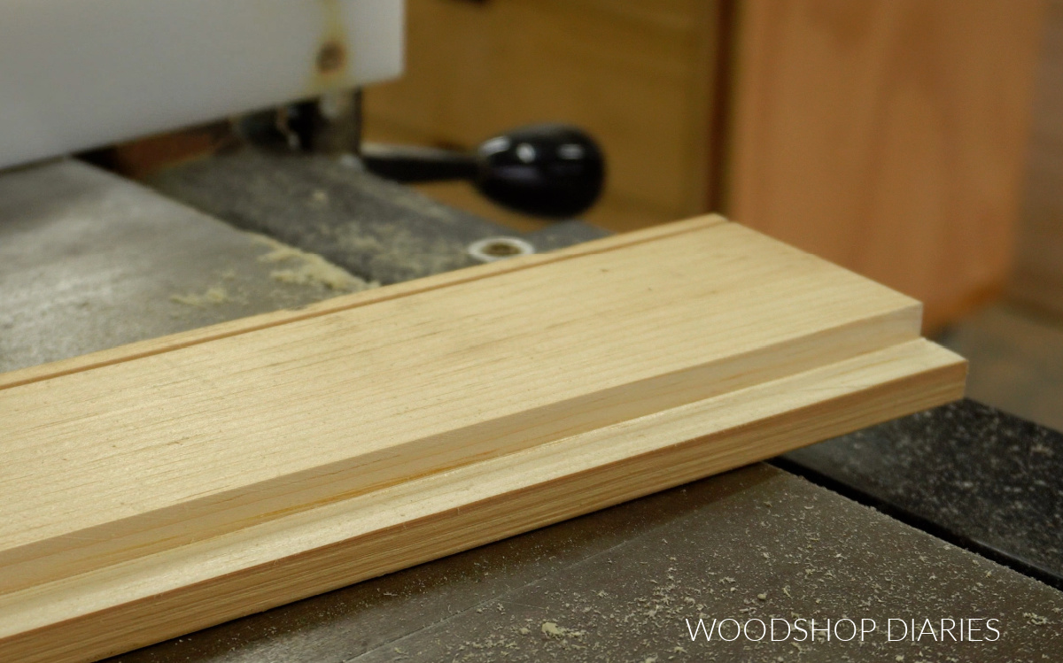 1x4 pine board with groove cut for plexiglass and notch cut for back board to make shadow box