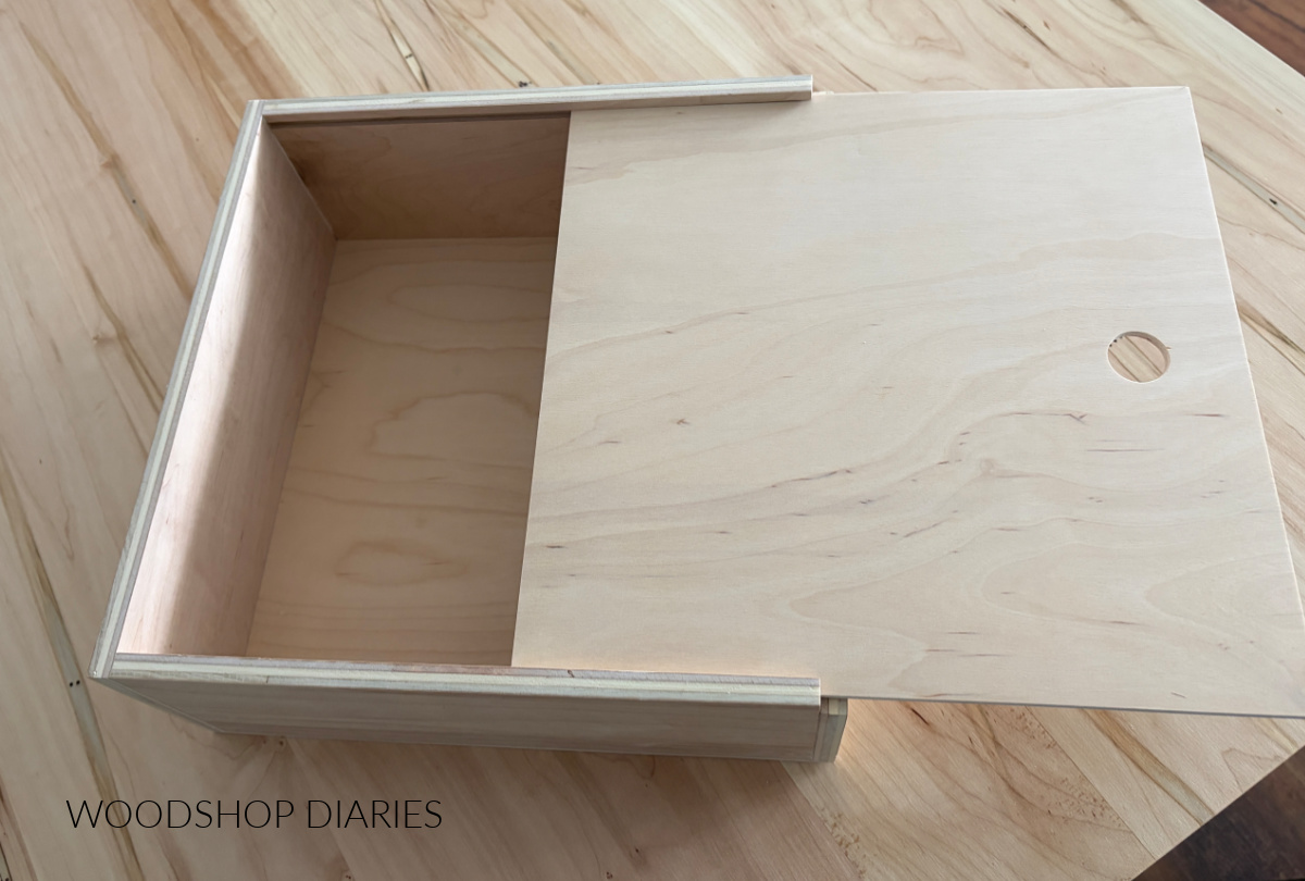 Scrap plywood pie box with sliding lid cut to size and slipped into dadoes on sides of box