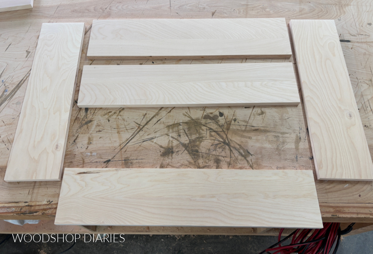 DIY Murphy desk plywood parts cut out on workbench