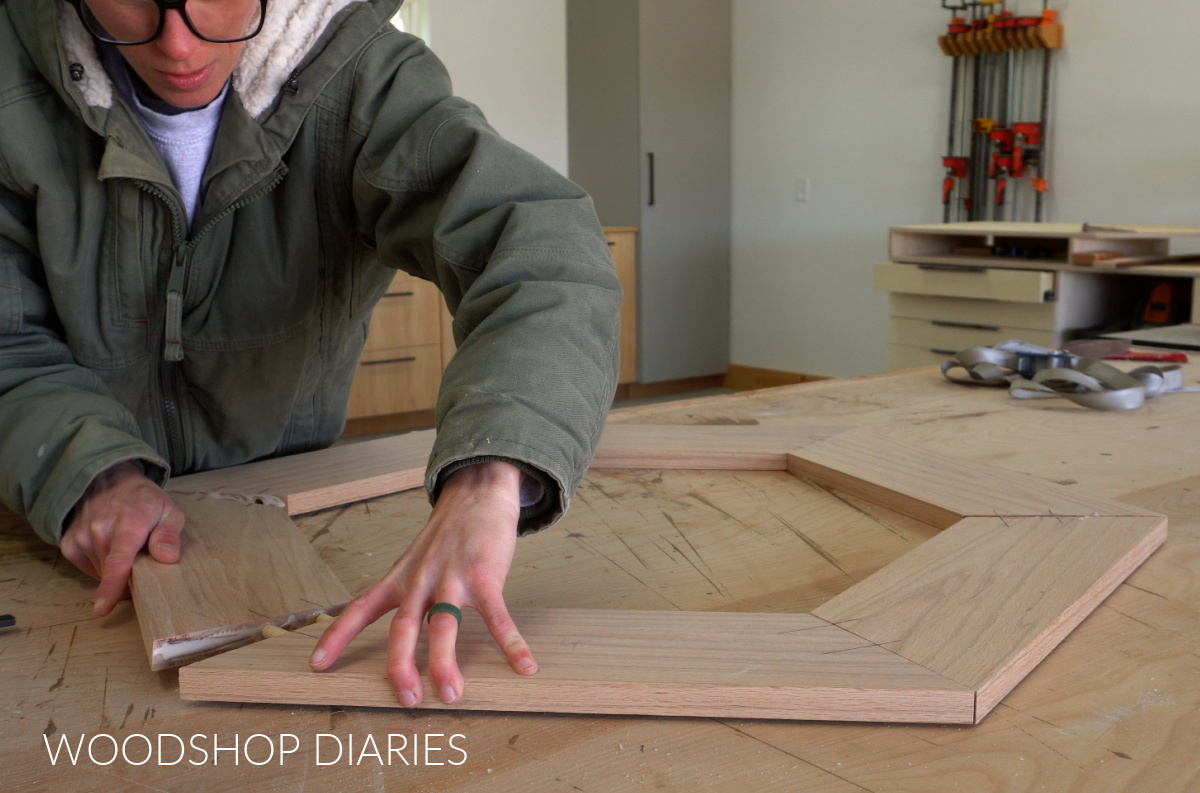 Shara Woodshop Diaries gluing up hexagon frame on workbench